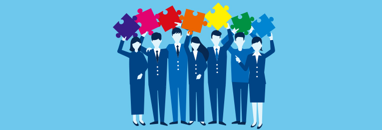 illustrative image of few people holding different color puzzle boards and posing for a photo